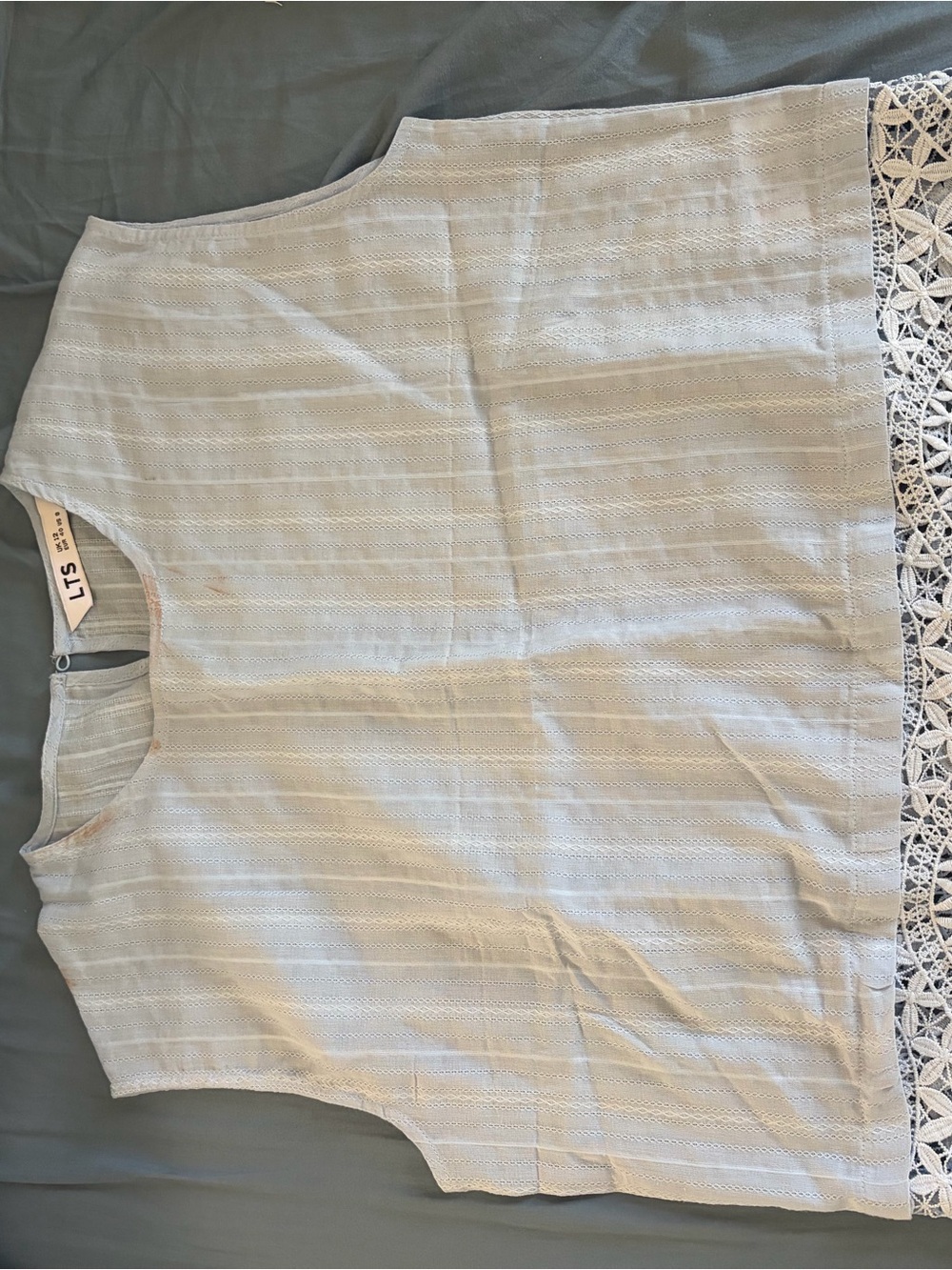 Sleeveless Cream Crochet-Hem Blouse by